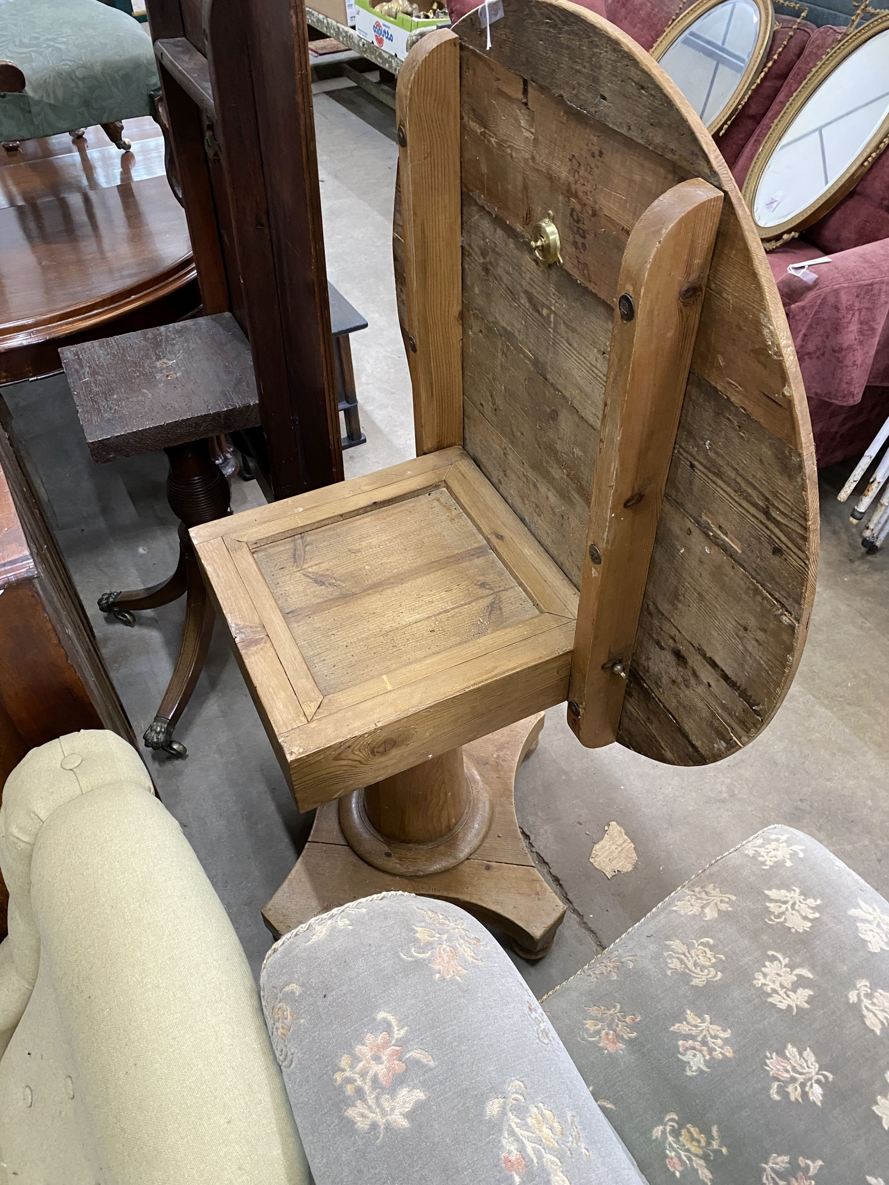 A Victorian circular pine tilt top breakfast table, diameter 92cm, height 73cm